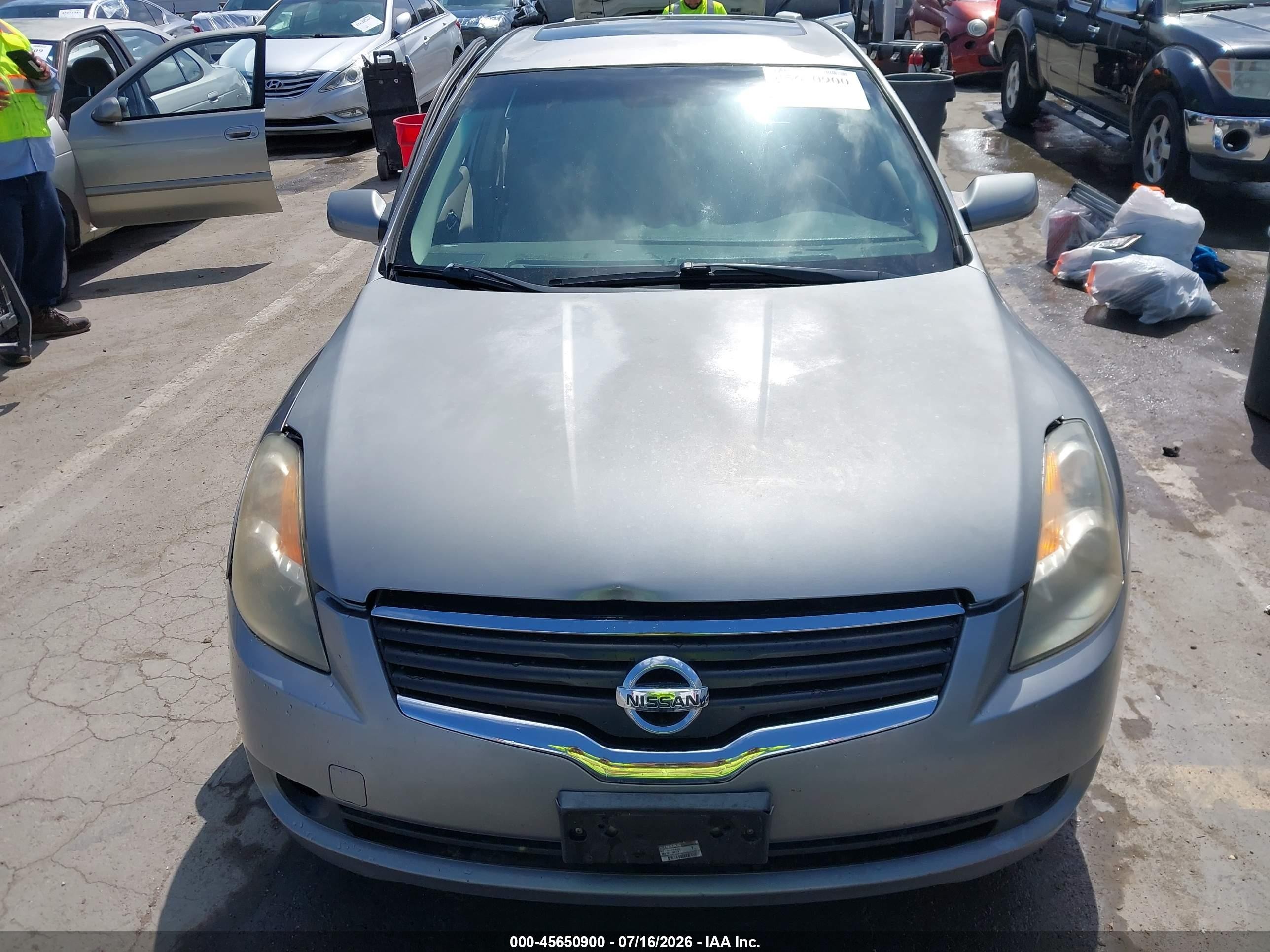 2007 Nissan Altima Hybrid   Silver vin: 1M4CL21E47C219682