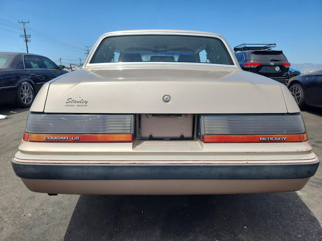 1986 Mercury Cougar Tan vin: 1MEBP92F3GH728237