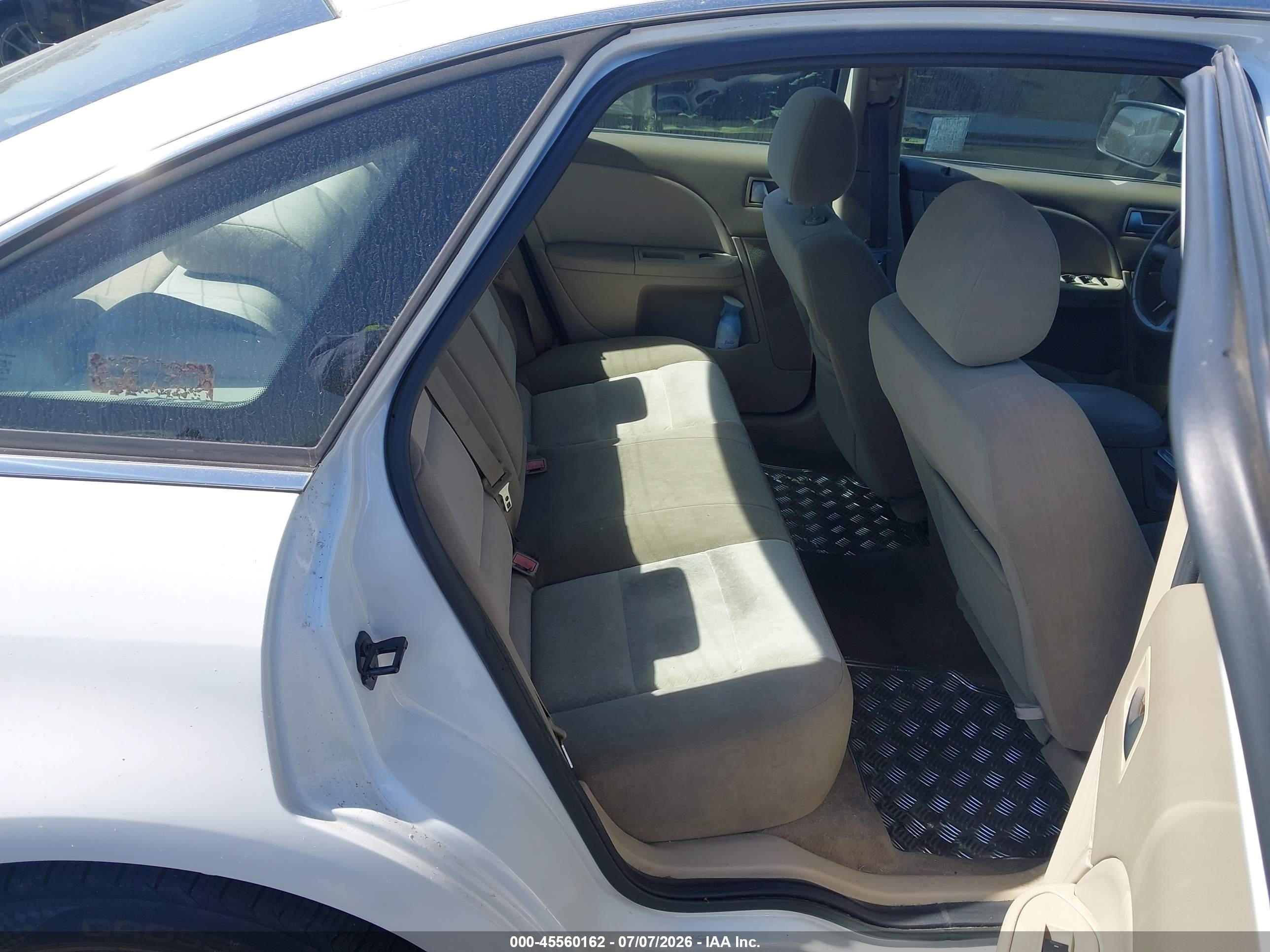 2005 Mercury Montego Luxury Белый vin: 1MEFM40175G615088