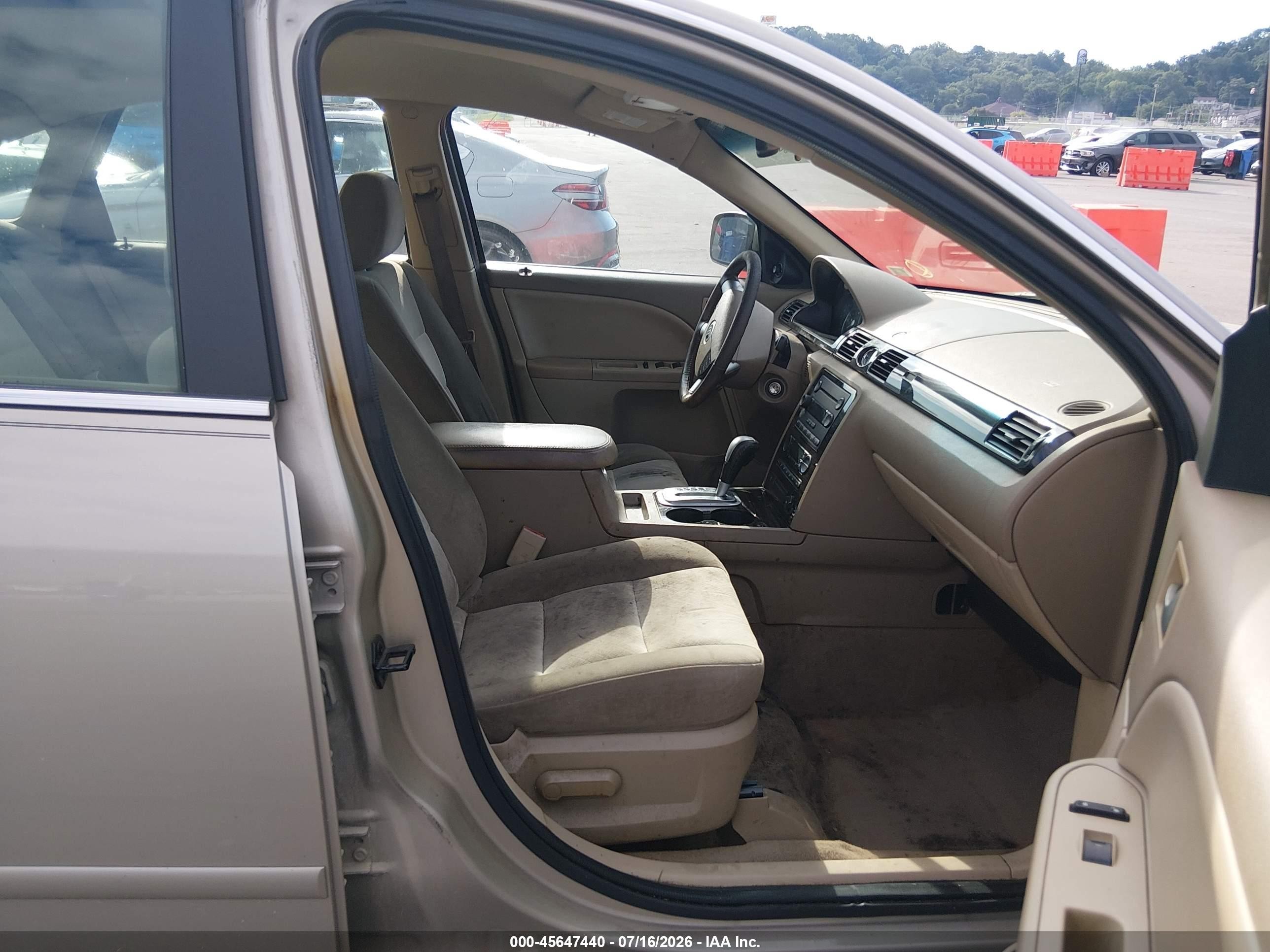 2006 Mercury Montego Luxury Золотой vin: 1MEFM40176G602164