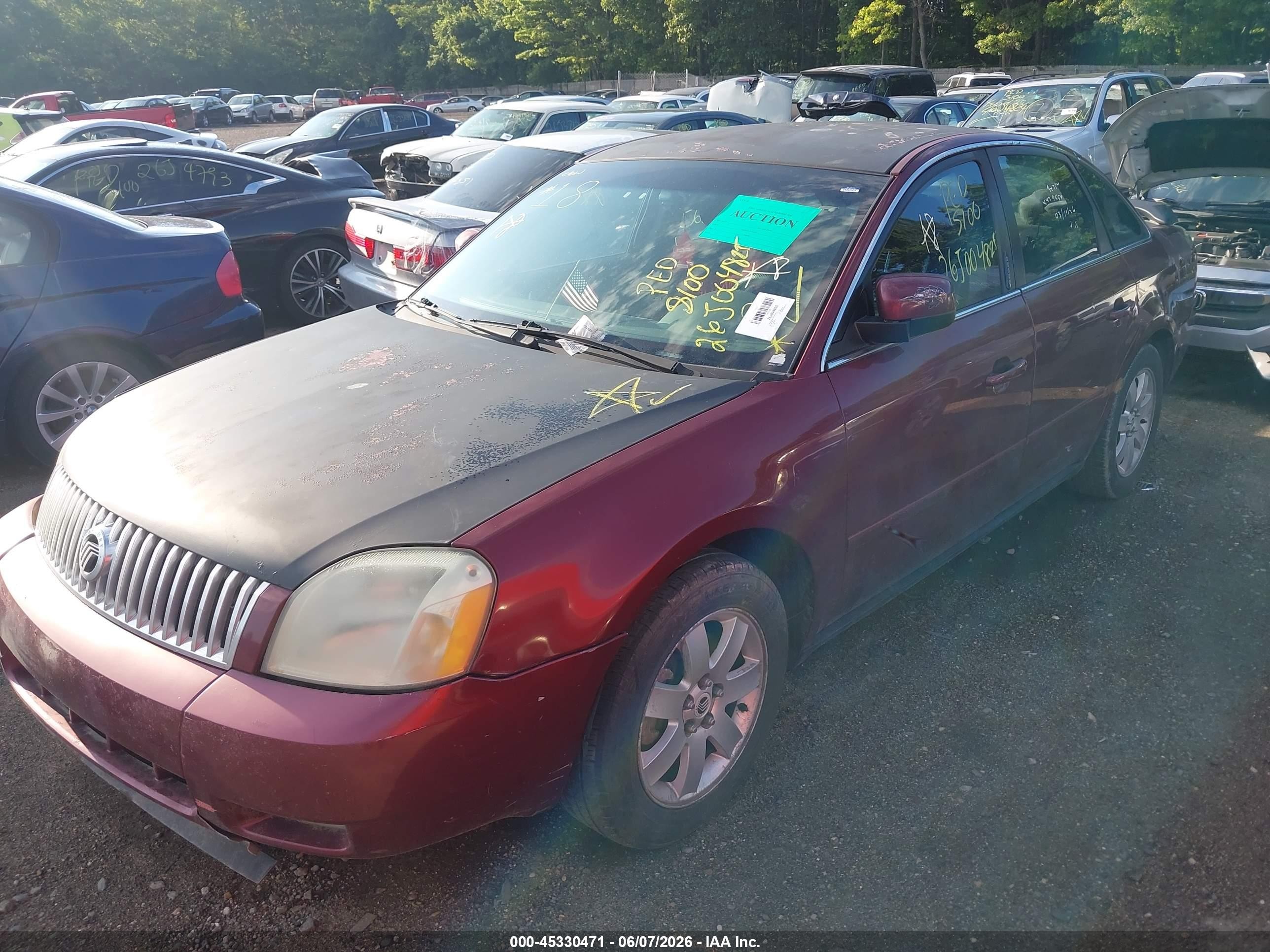2005 Mercury Montego Luxury Red vin: 1MEFM401X5G614713