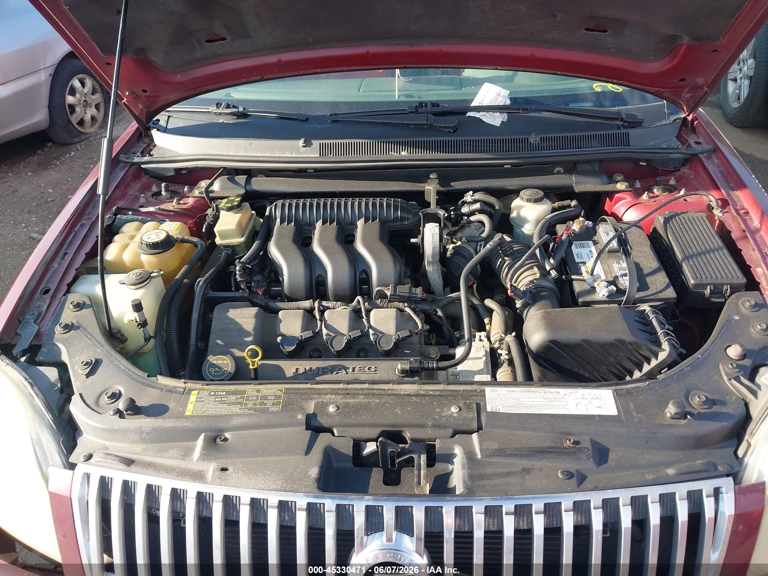 2005 Mercury Montego Luxury Red vin: 1MEFM401X5G614713