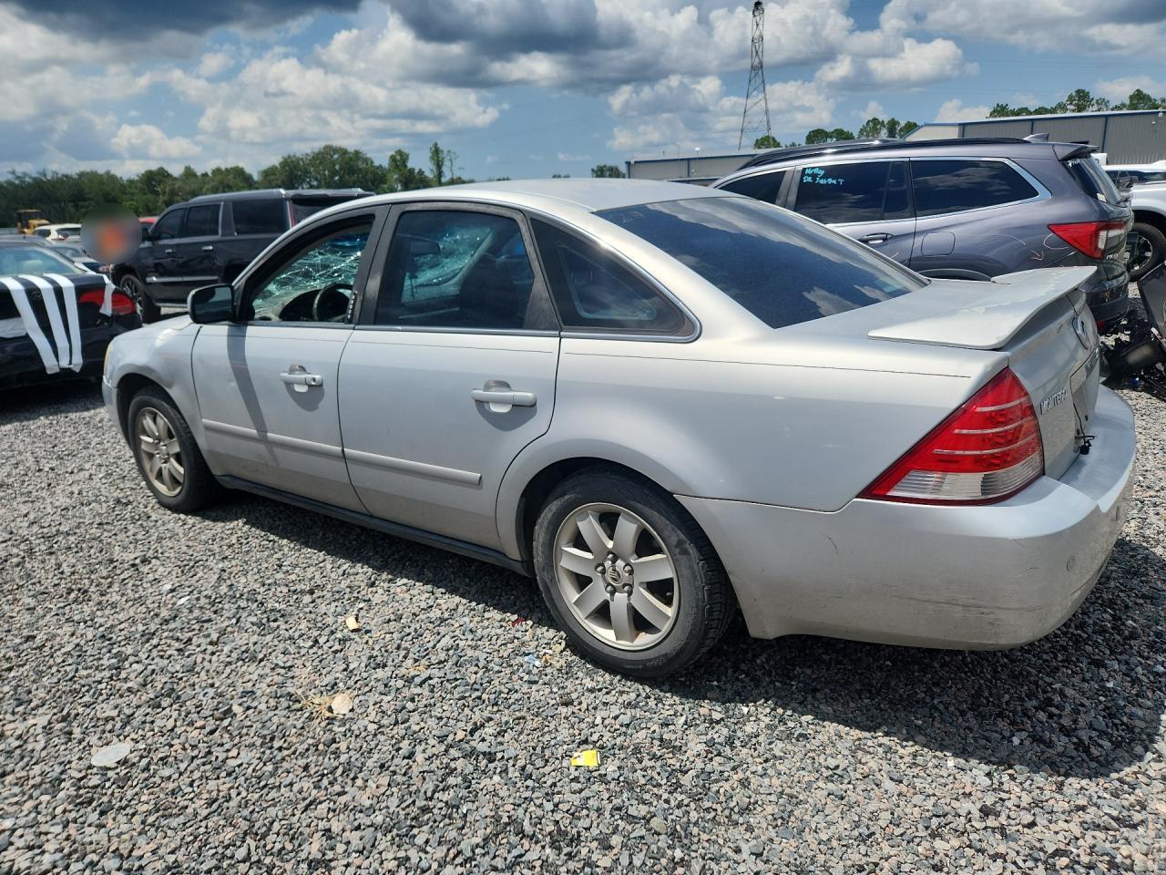 2005 Mercury Montego Luxury Серебряный vin: 1MEFM41165G603755