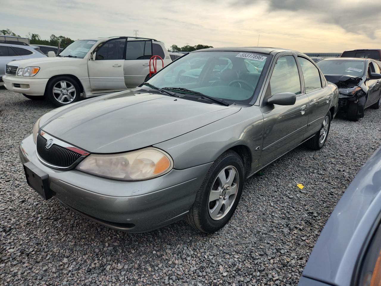 1998 Mercury Mystique Ls Tan vin: 1MEFM66L2WK634635