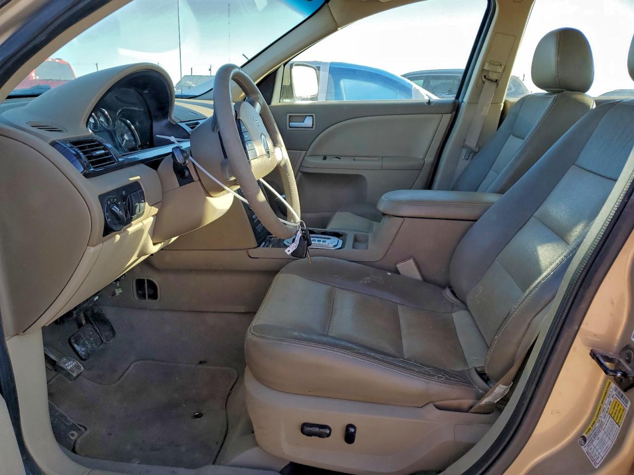 2007 Mercury Montego Luxury Tan vin: 1MEHM40147G610085