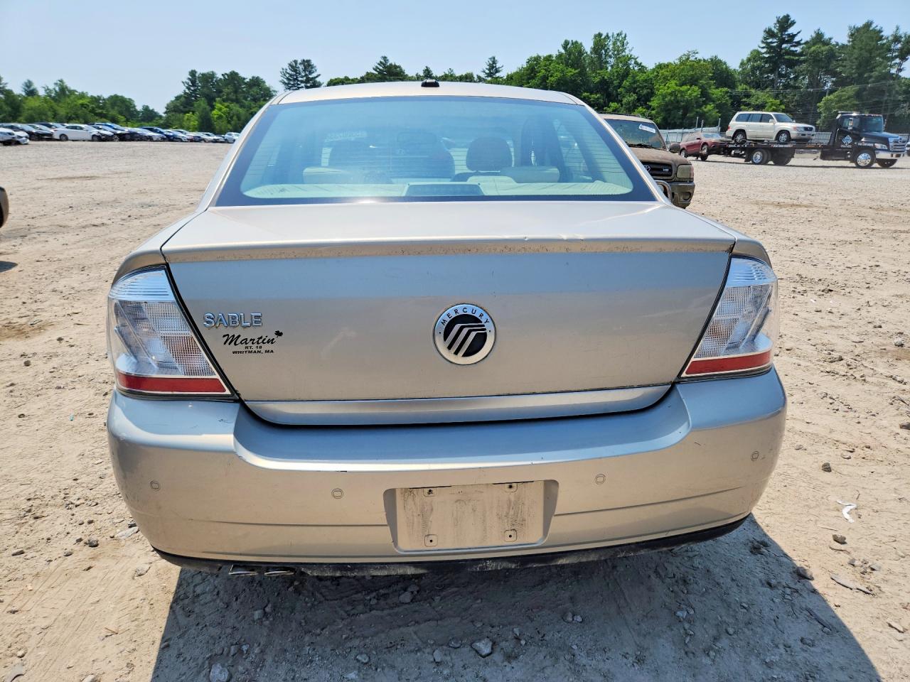 2009 Mercury Sable Cream vin: 1MEHM40W29G610102