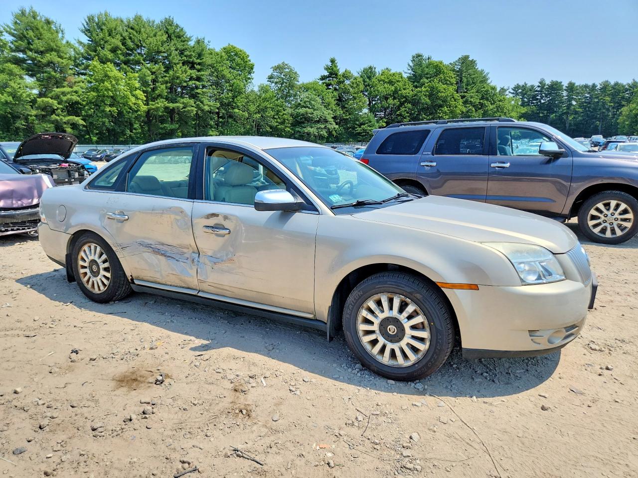 2009 Mercury Sable Cream vin: 1MEHM40W29G610102