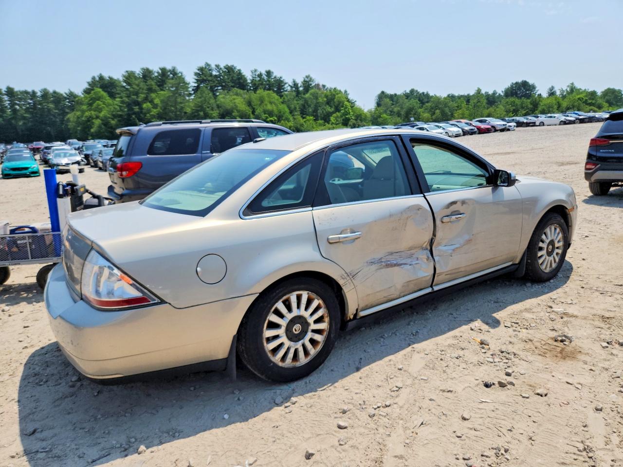 2009 Mercury Sable Cream vin: 1MEHM40W29G610102
