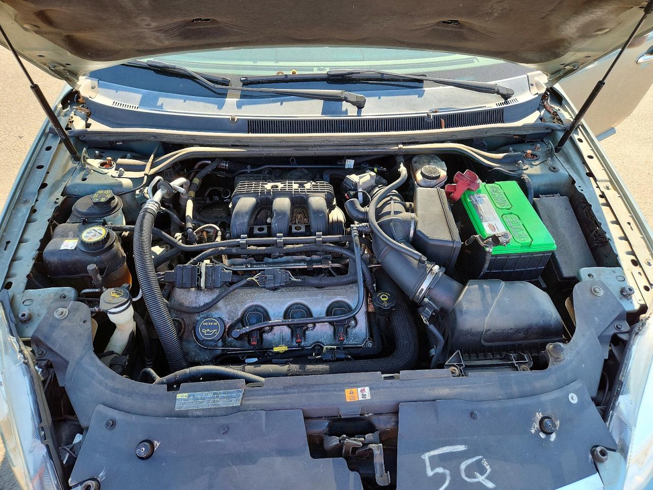 2008 Mercury Sable Premier Teal vin: 1MEHM42W48G616527