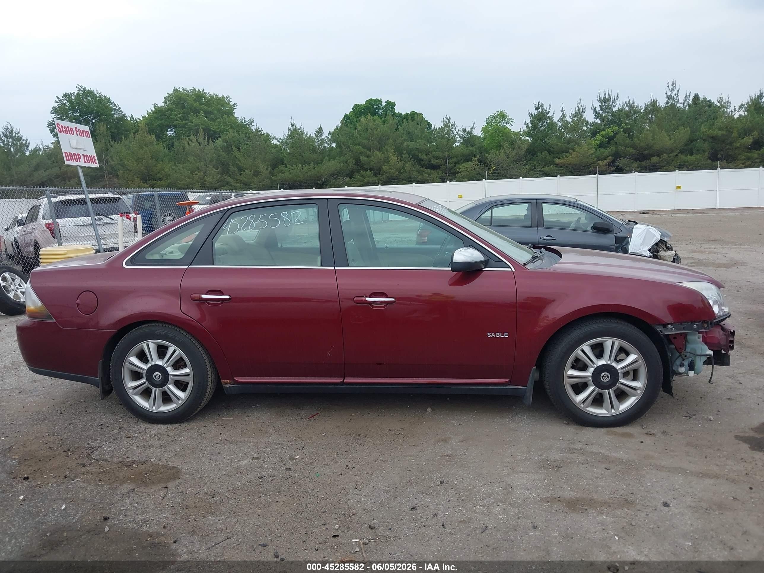2008 Mercury Sable Premier Maroon vin: 1MEHM42W78G602797
