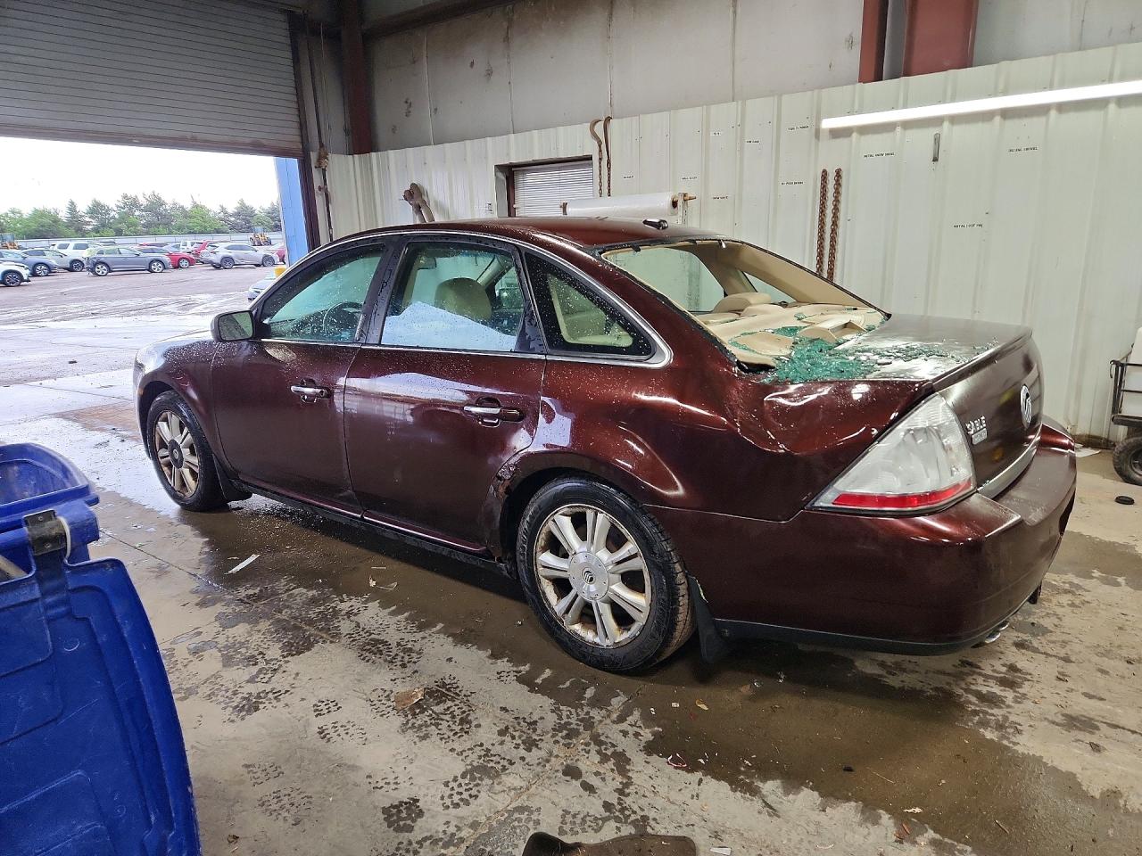 2009 Mercury Sable Premier Maroon vin: 1MEHM42W89G626706