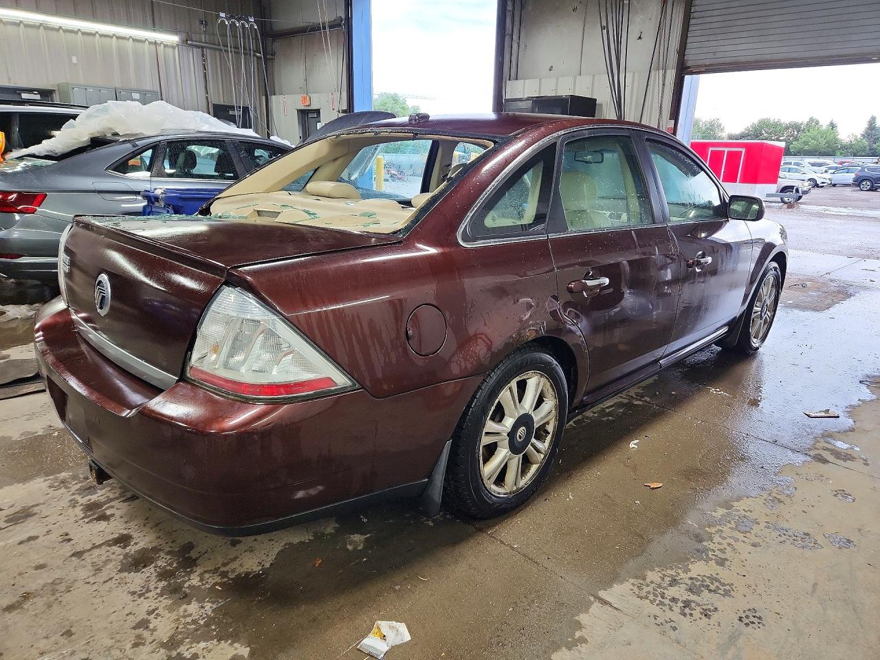 2009 Mercury Sable Premier Maroon vin: 1MEHM42W89G626706