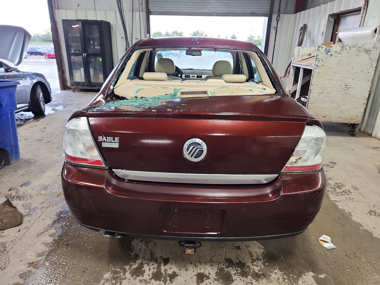 2009 Mercury Sable Premier Maroon vin: 1MEHM42W89G626706