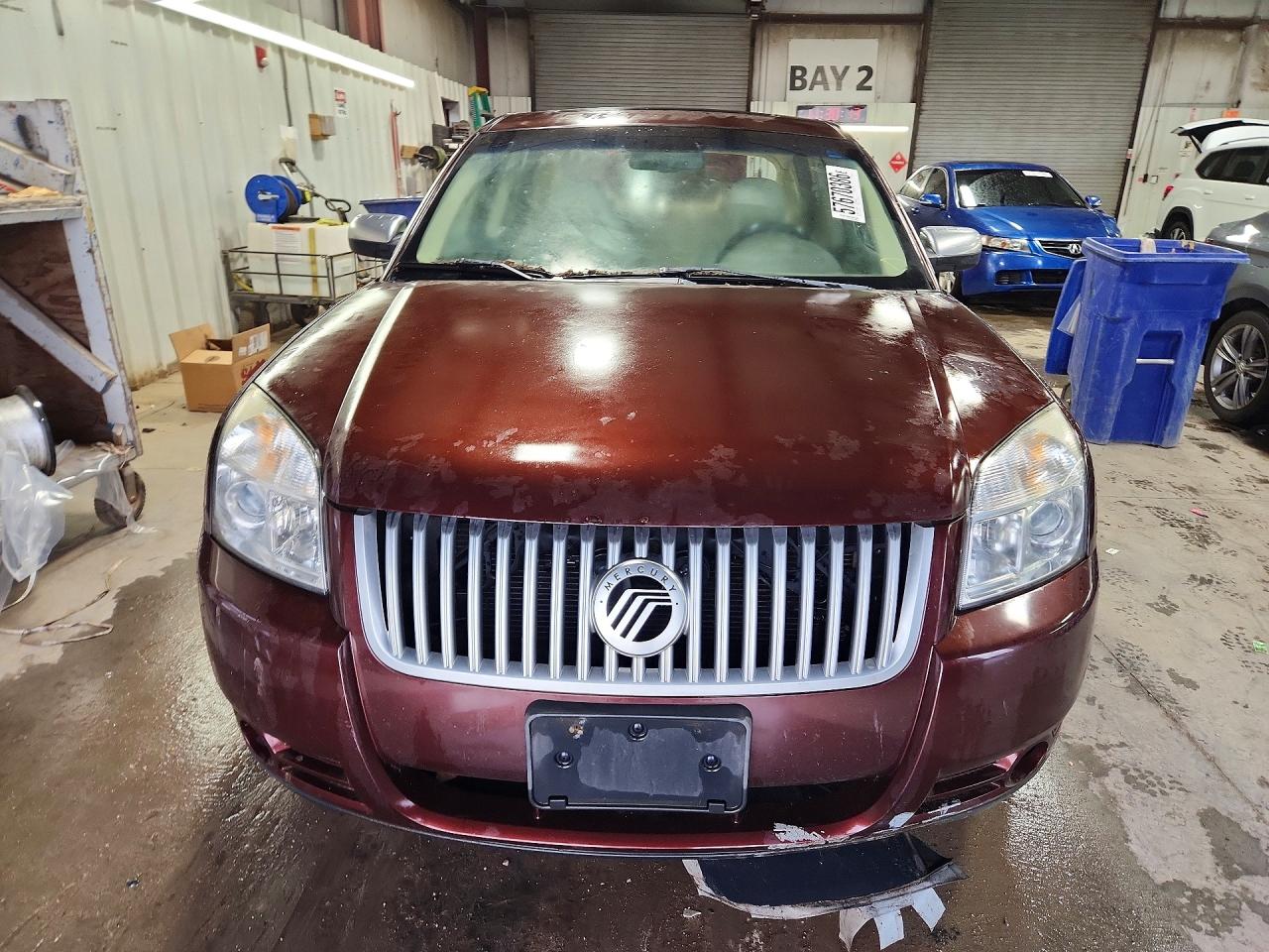 2009 Mercury Sable Premier Maroon vin: 1MEHM42W89G626706