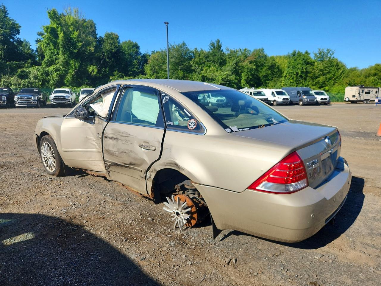 2005 Mercury Montego Premier Gold vin: 1MEHM43105G608648