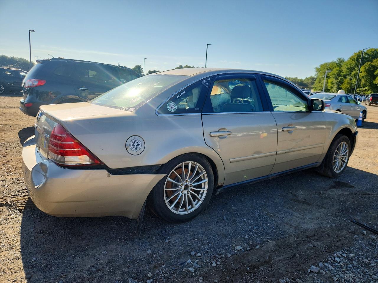 2005 Mercury Montego Premier Gold vin: 1MEHM43105G608648