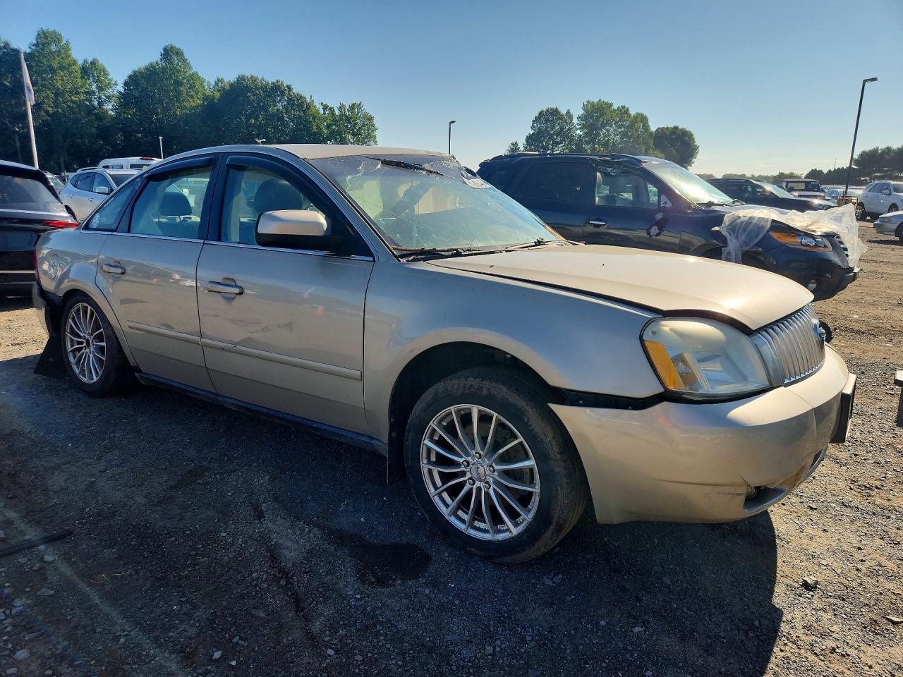 2005 Mercury Montego Premier Gold vin: 1MEHM43105G608648
