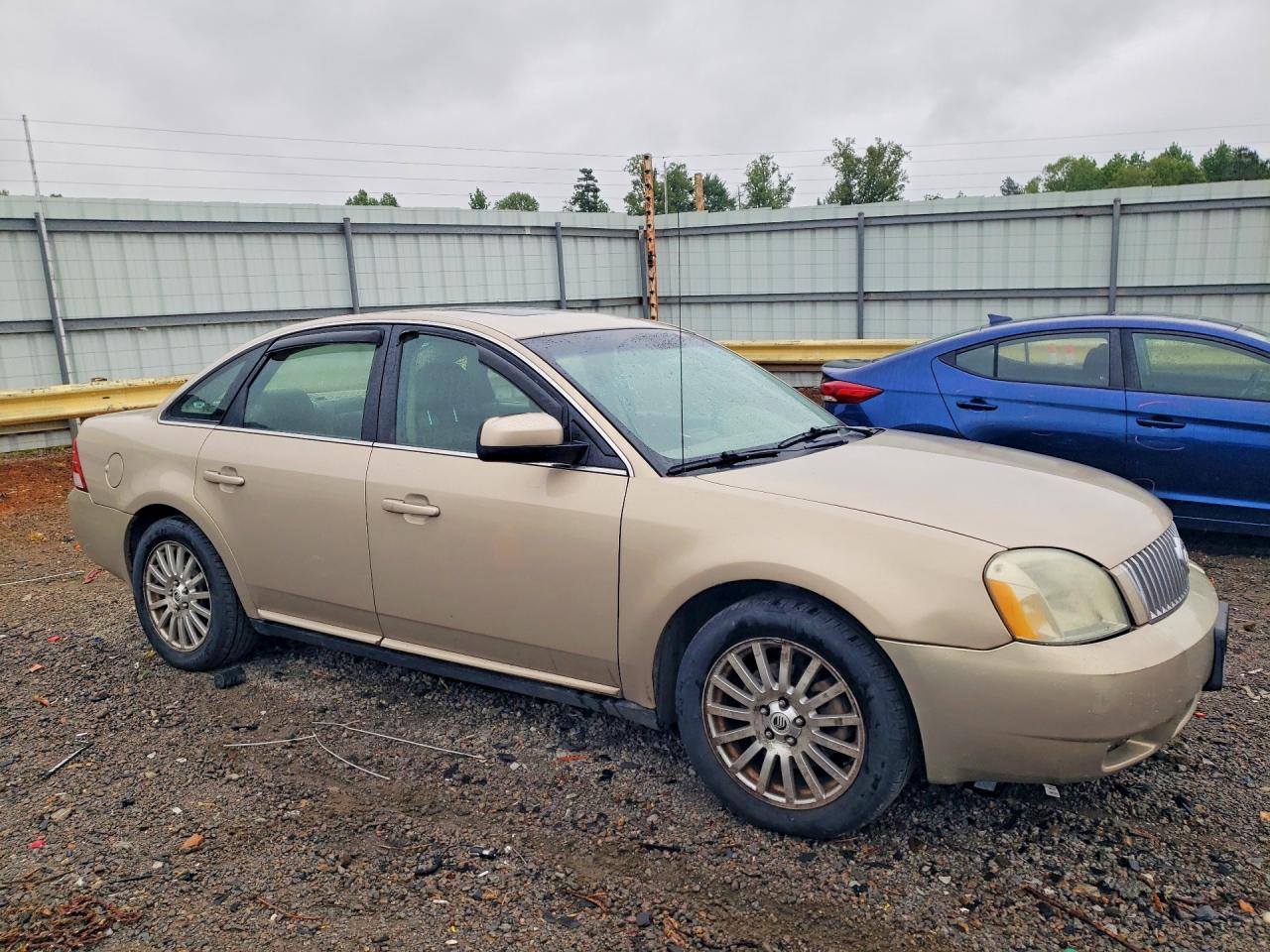 2007 Mercury Montego Premier Gold vin: 1MEHM43197G603029