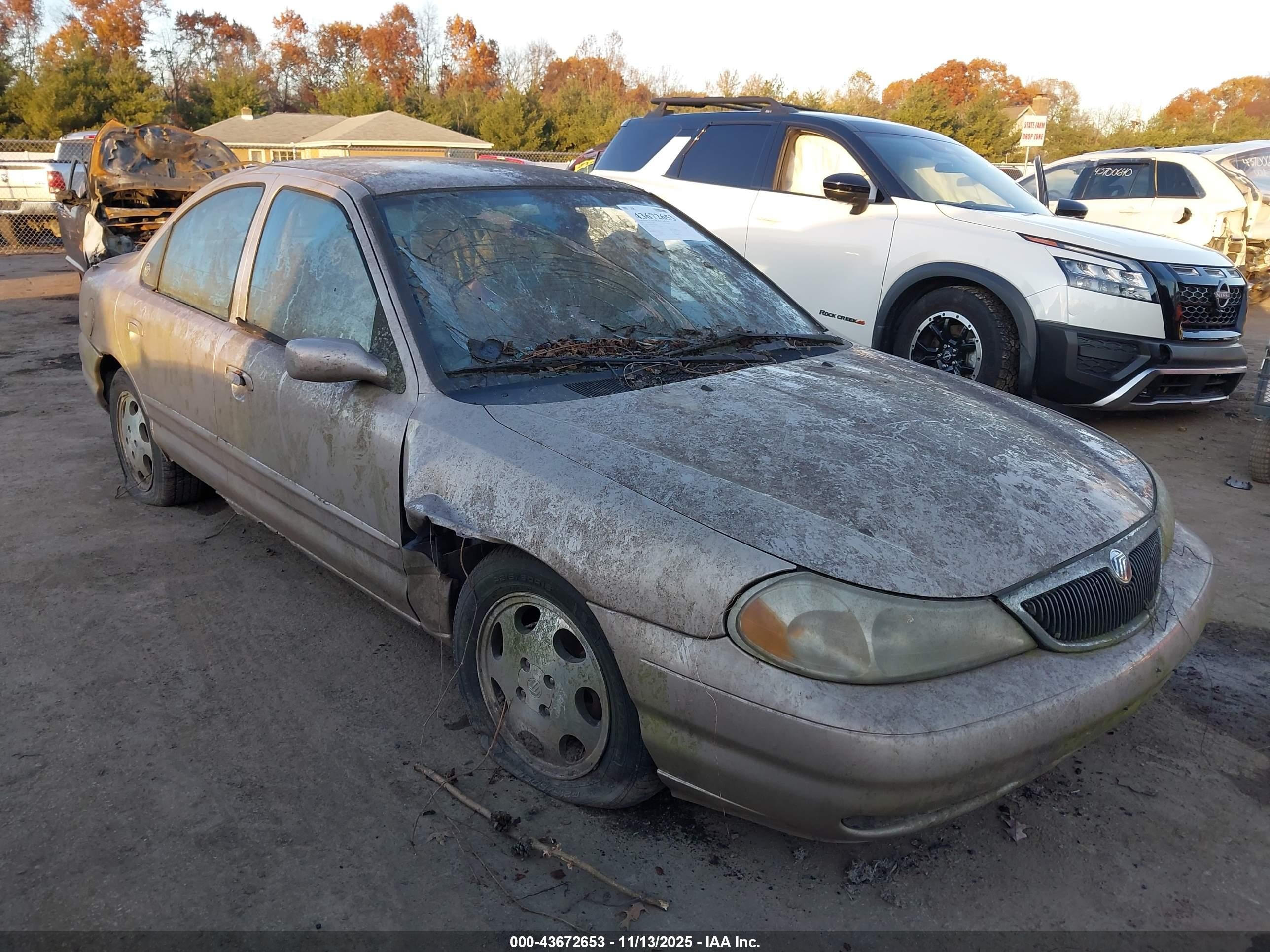 1998 Mercury Mystique   Tan vin: 1MELM6539WK623653