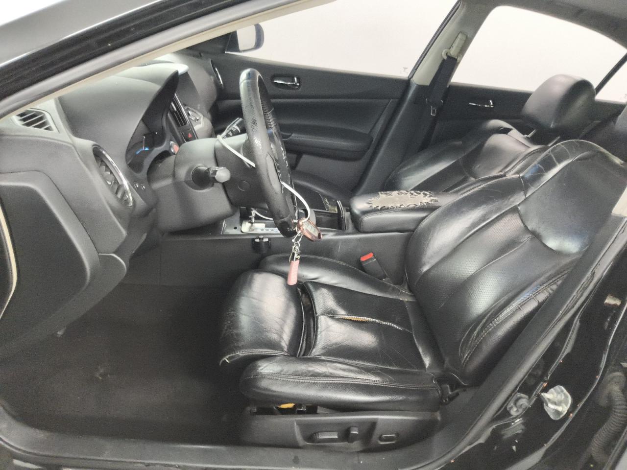 2012 Nissan Maxima 3.5 S Черный vin: 1N4AA5AP1CC810546 Damage: Left Front Seat, Torn, > 12 Inches