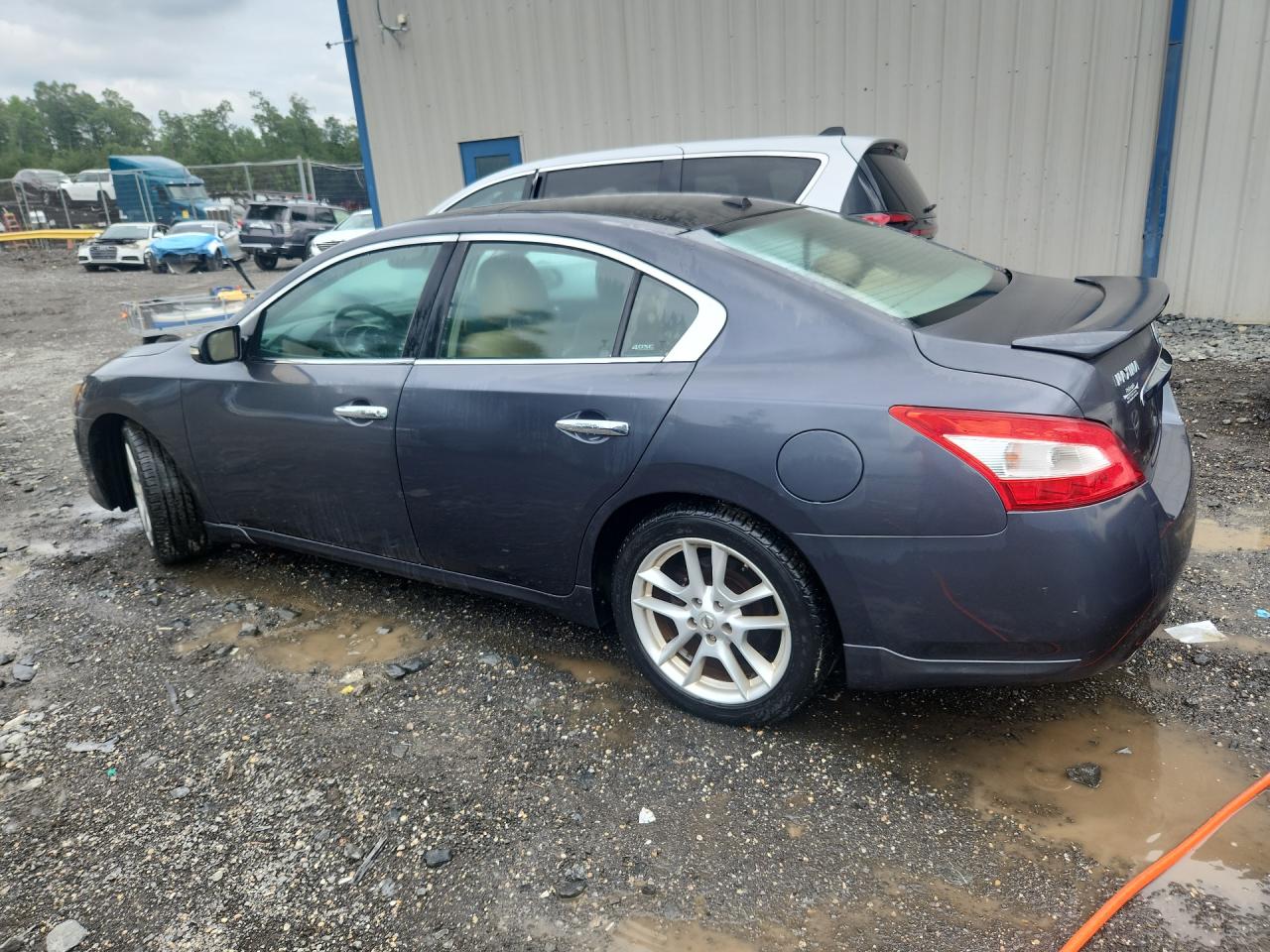 2010 Nissan Maxima 3.5 S Blue vin: 1N4AA5AP5AC844437 Damage: Left Rear Door, Dent(S) W/ Paint Dmg, 1/2 To 1 Inch