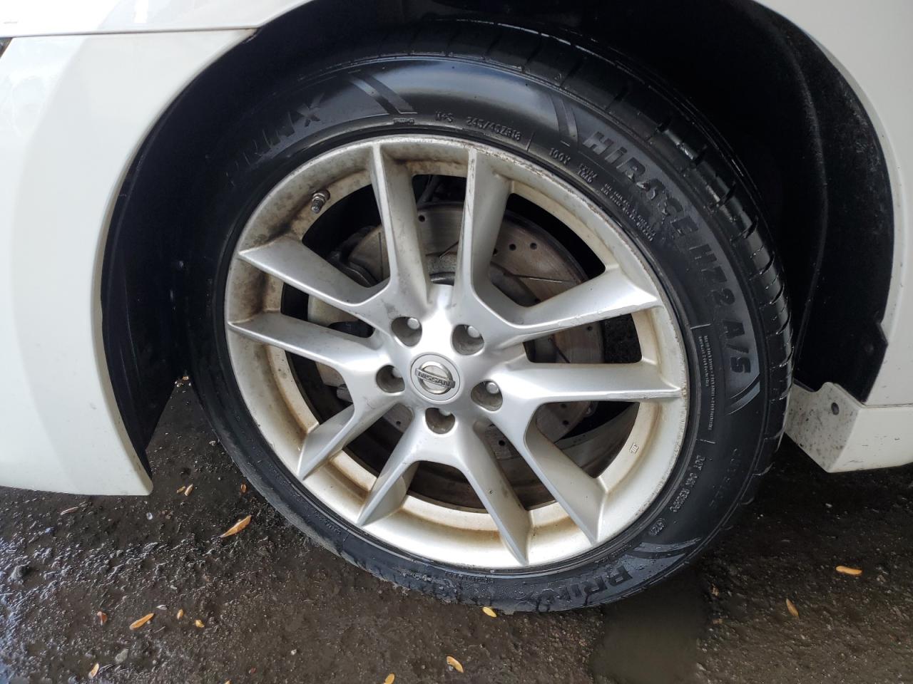 2010 Nissan Maxima 3.5 S White vin: 1N4AA5APXAC828931 Damage: Left Front Wheel, Curb Rash, > 12 Inches