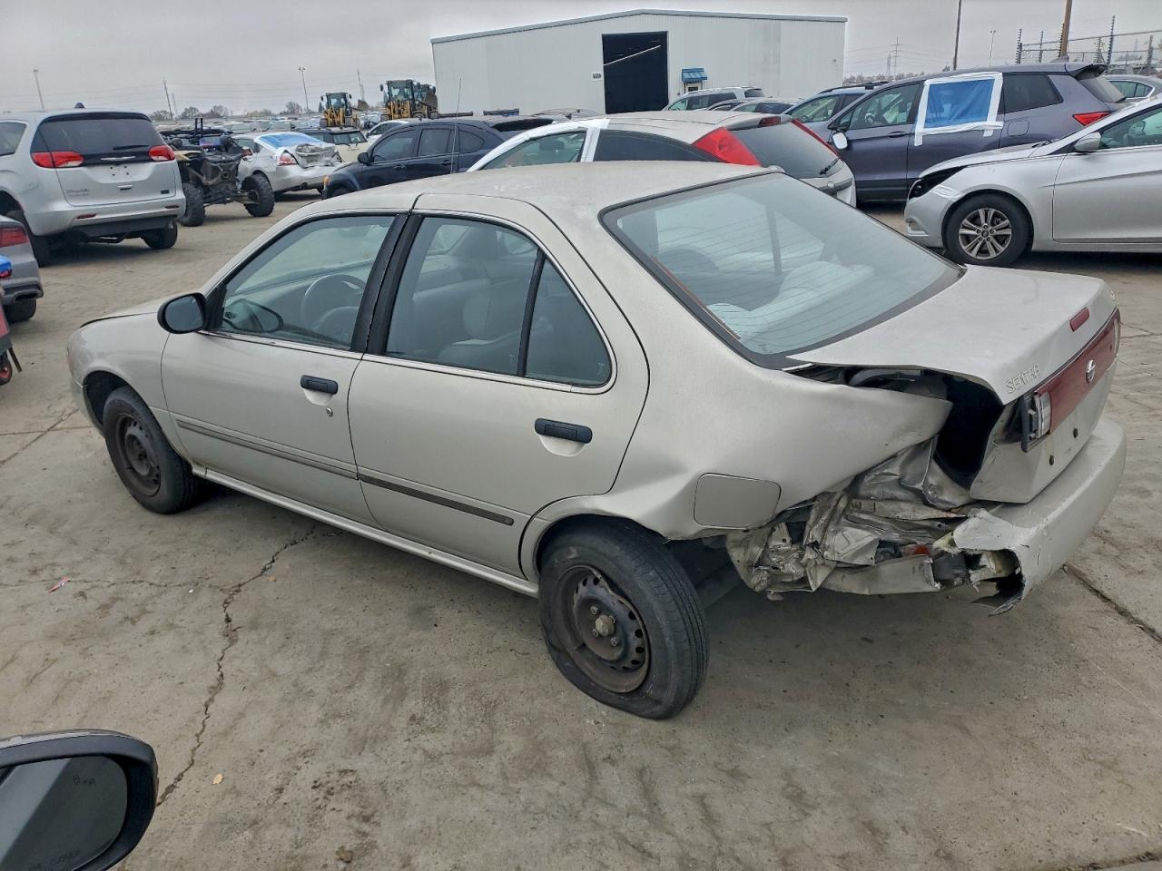 1995 Nissan Sentra Base Tan vin: 1N4AB41D1SC760369
