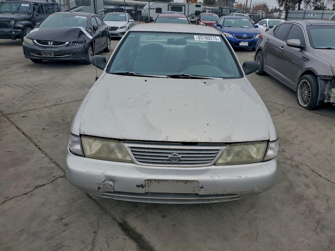 1995 Nissan Sentra Base Tan vin: 1N4AB41D1SC760369