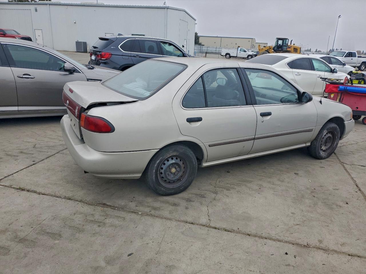1995 Nissan Sentra Base Tan vin: 1N4AB41D1SC760369