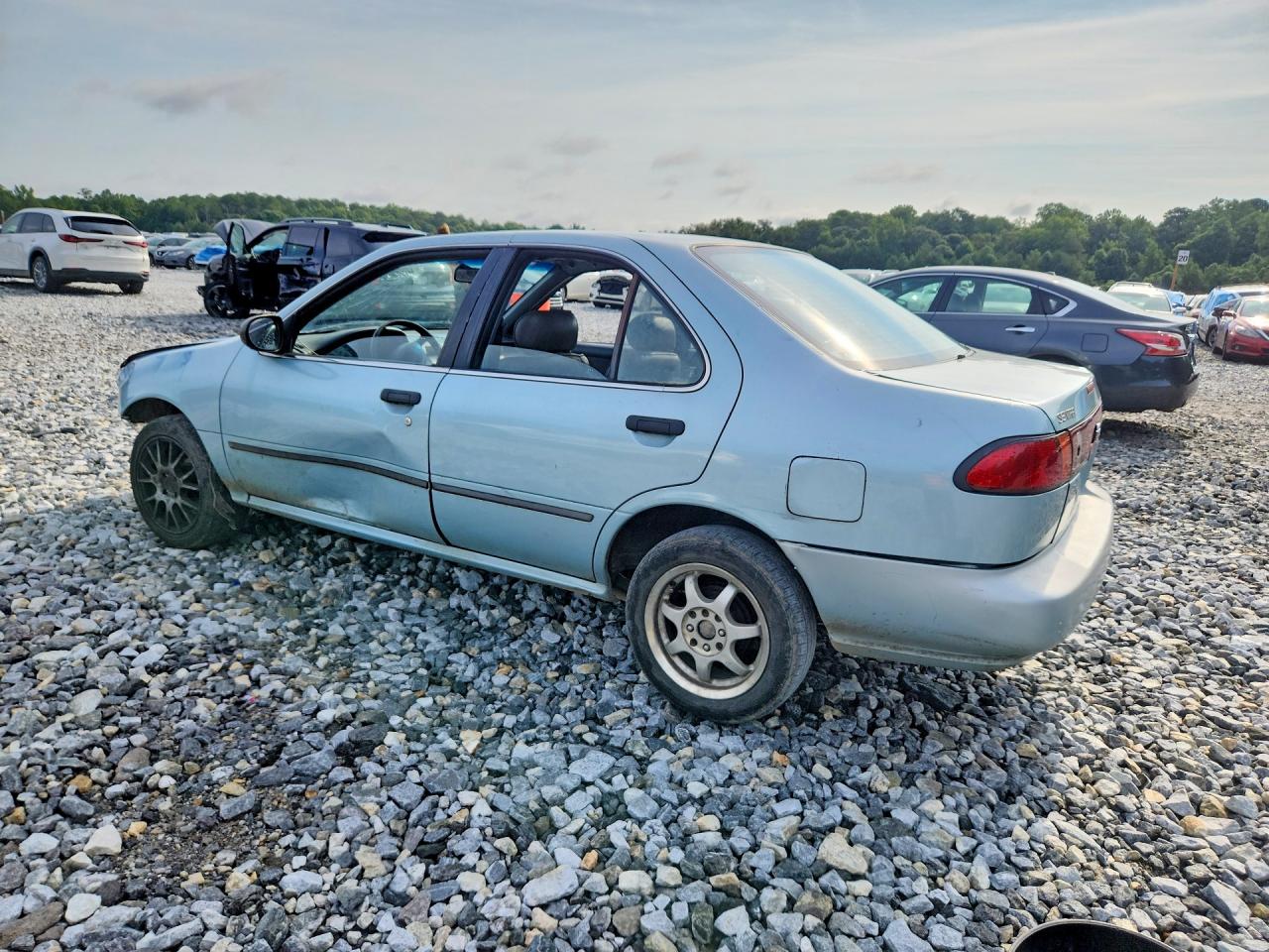 1997 Nissan Sentra Base Teal vin: 1N4AB41D4VC745790
