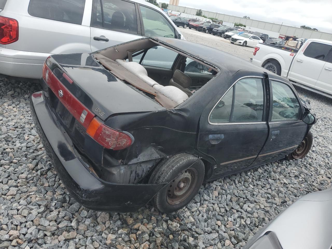 1995 Nissan Sentra Base Black vin: 1N4AB41D7SC728817