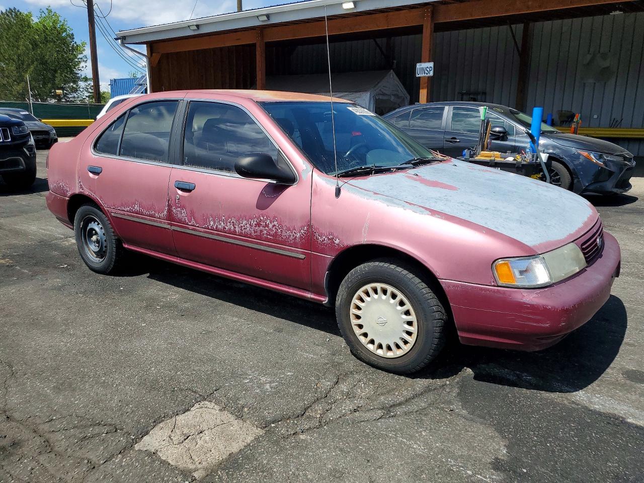 1995 Nissan Sentra Base Maroon vin: 1N4AB41DXSC771192