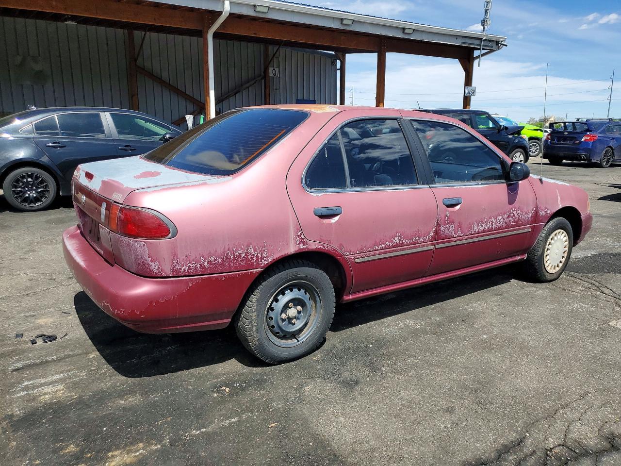 1995 Nissan Sentra Base Maroon vin: 1N4AB41DXSC771192
