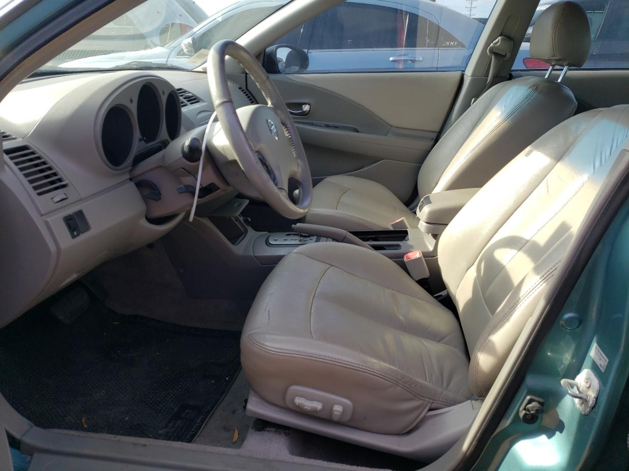 2002 Nissan Altima Base Turquoise vin: 1N4AL11D12C141461