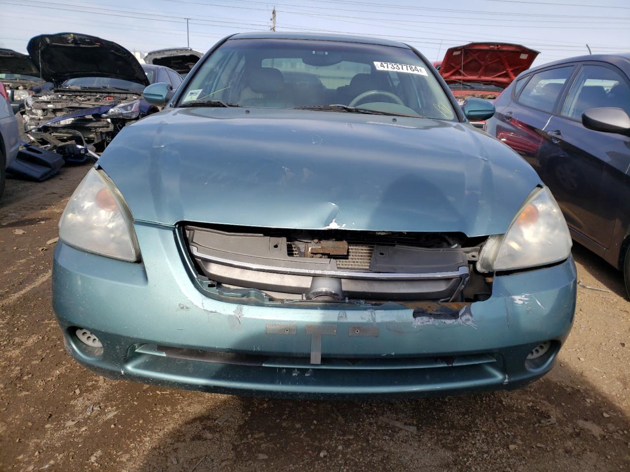 2002 Nissan Altima Base Turquoise vin: 1N4AL11D12C141461