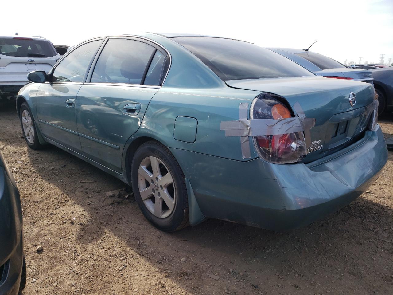 2002 Nissan Altima Base Turquoise vin: 1N4AL11D12C141461