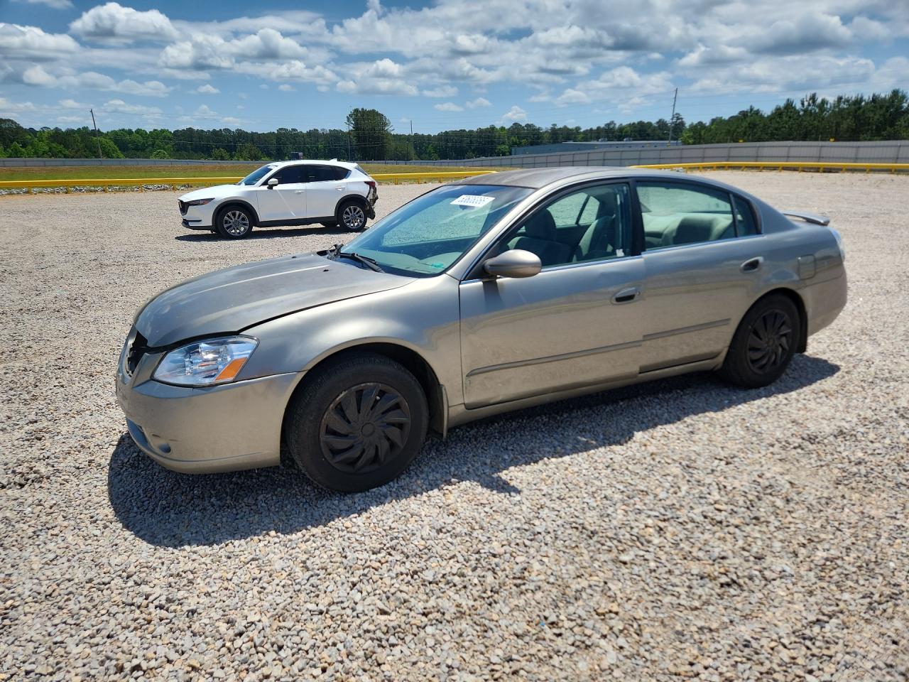 2005 Nissan Altima 2.5 Tan vin: 1N4AL11D25N442054