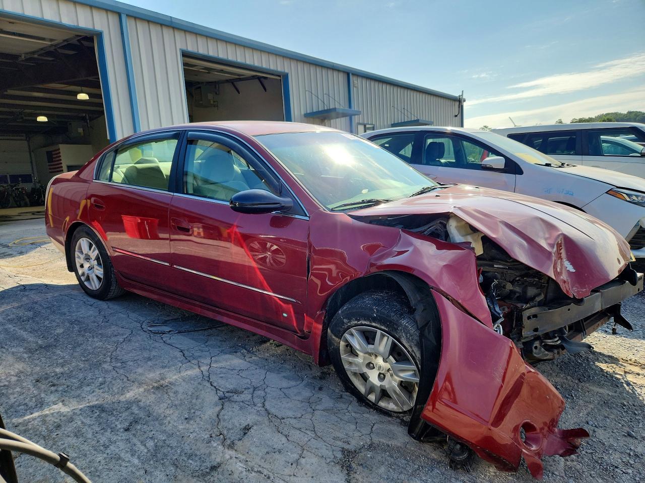 2006 Nissan Altima 2.5 Red vin: 1N4AL11D46C108136