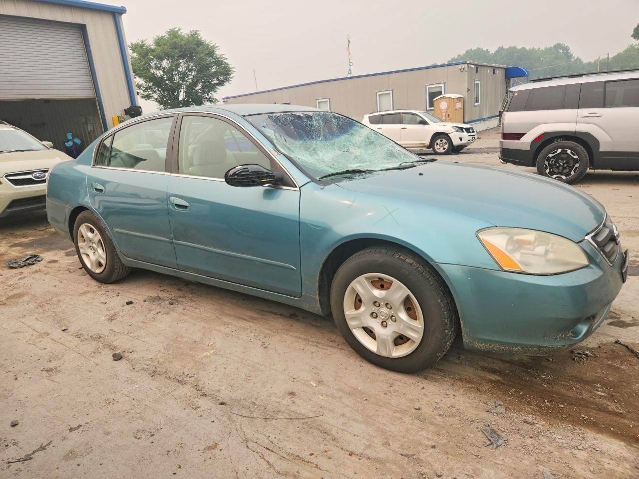 2002 Nissan Altima 2.5 Turquoise vin: 1N4AL11D52C702342