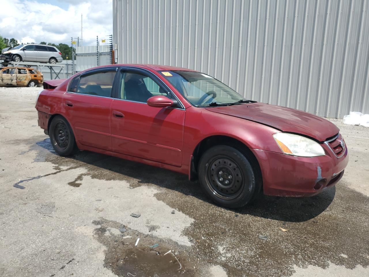 2003 Nissan Altima Base Burgundy vin: 1N4AL11D63C352592