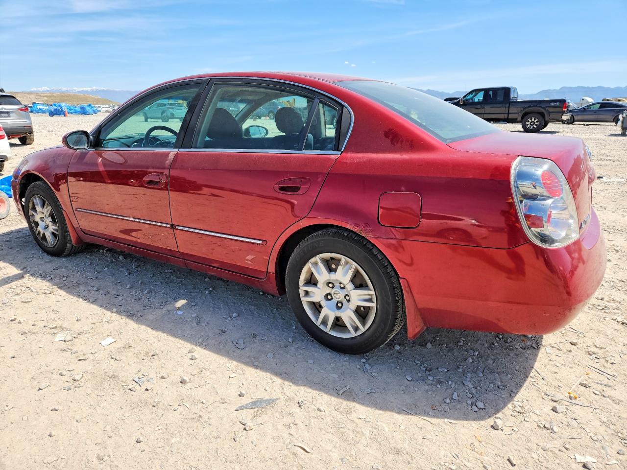 2006 Nissan Altima 2.5 Red vin: 1N4AL11D76N309419