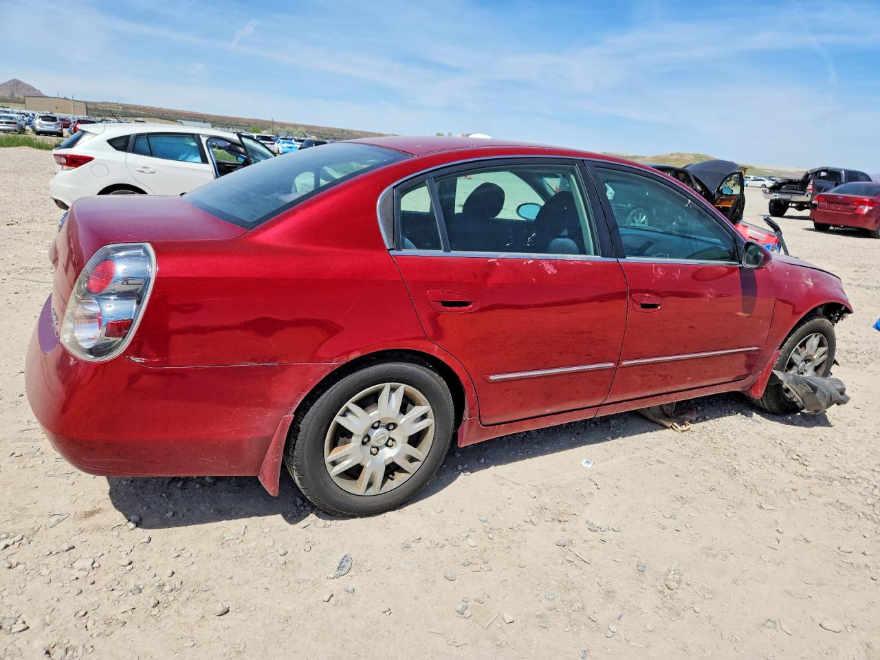 2006 Nissan Altima 2.5 Red vin: 1N4AL11D76N309419