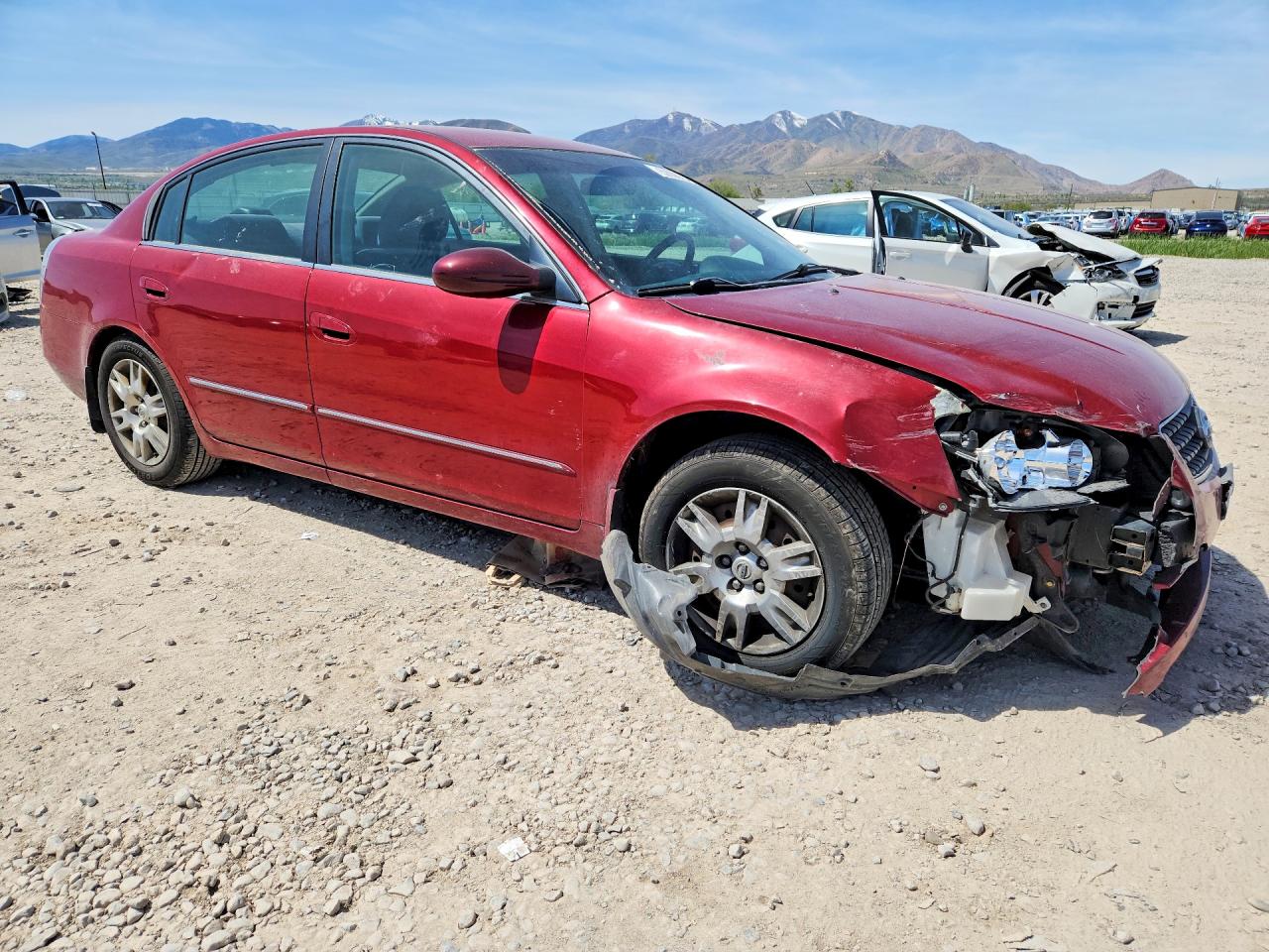 2006 Nissan Altima 2.5 Red vin: 1N4AL11D76N309419