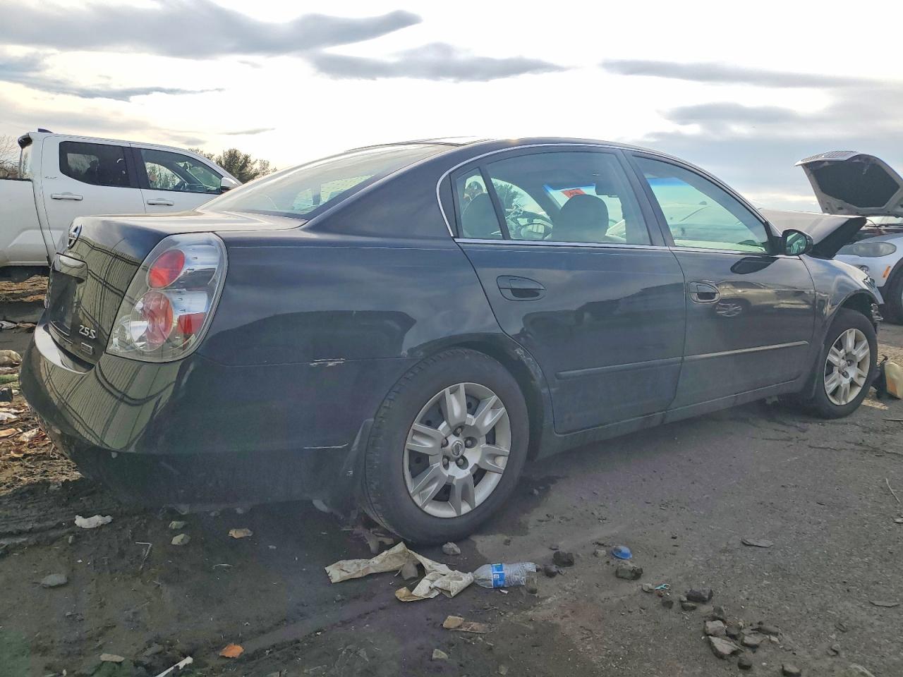 2006 Niss Altima Black vin: 1N4AL11D76N320386