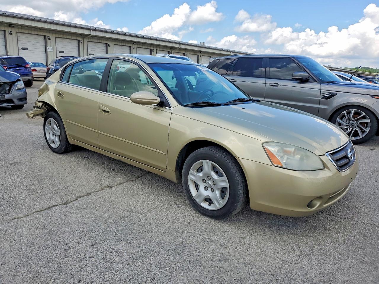 2002 Nissan Altima Gold vin: 1N4AL11D92C260181