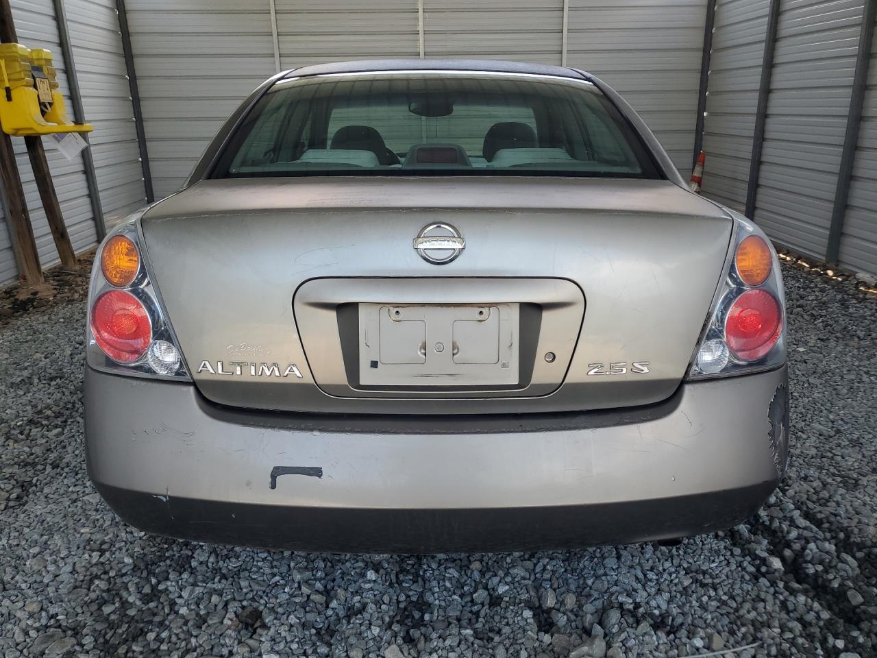 2003 Nissan Altima 2.5 Желто-коричневый vin: 1N4AL11DX3C110548 Damage: Deck Lid, Peeling, > 12 Inches