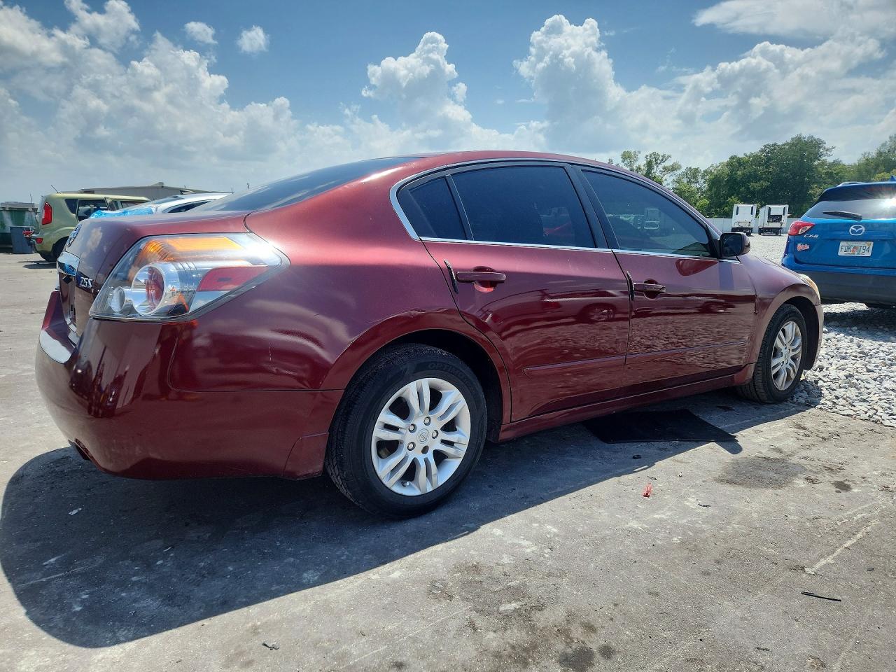 2010 Nissan Altima 2.5 Red vin: 1N4AL2AP0AN525721