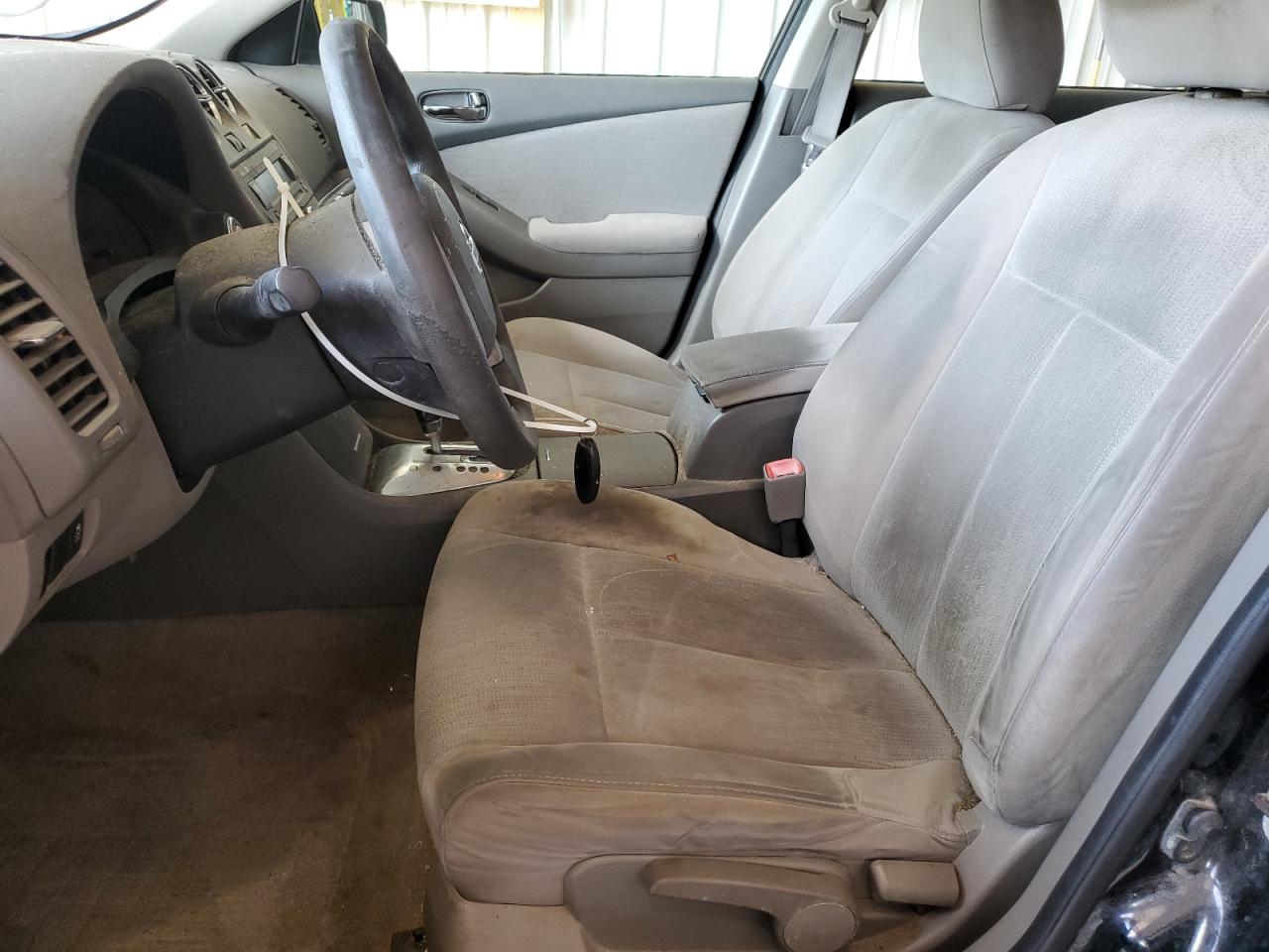 2012 Nissan Altima 2.5 Black vin: 1N4AL2AP2CN493373 Damage: Left Front Seat Cushion, Stained, Permanent