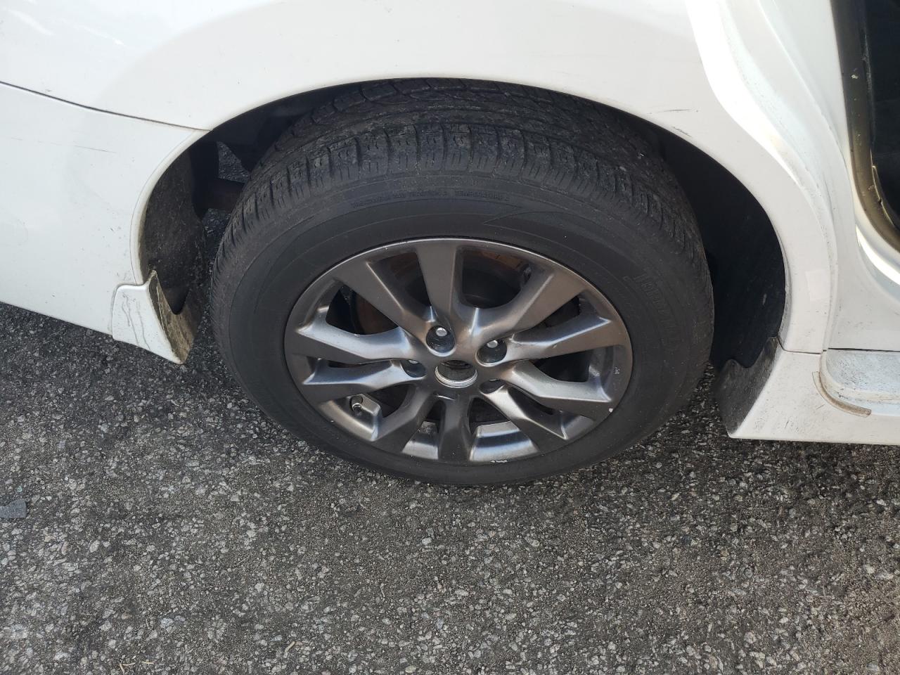 2015 Nissan Altima 2.5 S White vin: 1N4AL3AP2FN405660 Damage: Right Rear Wheel, Curb Rash, 2 To 3 Inches