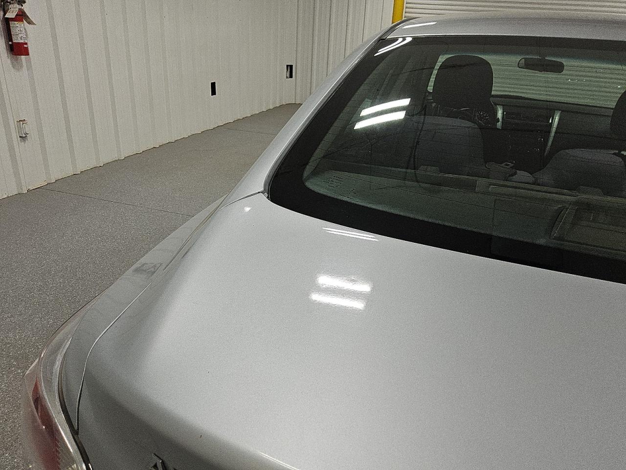 2015 Nissan Altima 2.5 S Silver vin: 1N4AL3AP6FN389687 Damage: Deck Lid, Dent(S) W/ Paint Dmg, 4 To 5 Inches